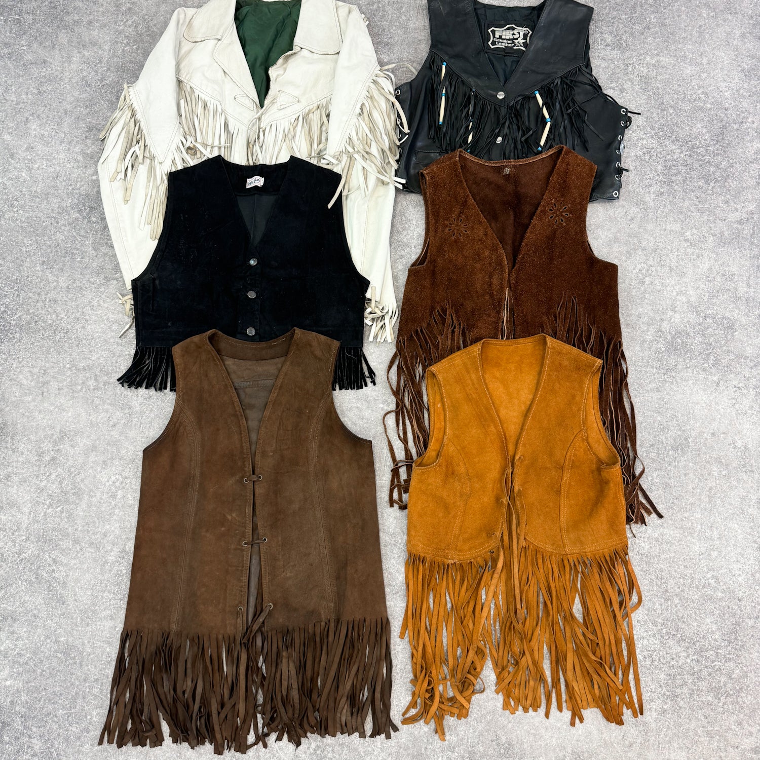 veste-veston-cuir-daim-franges-homme-femme-grossiste-vintage-vetement-friperie-wholesaler-seconde-main-80-90-2000-2010