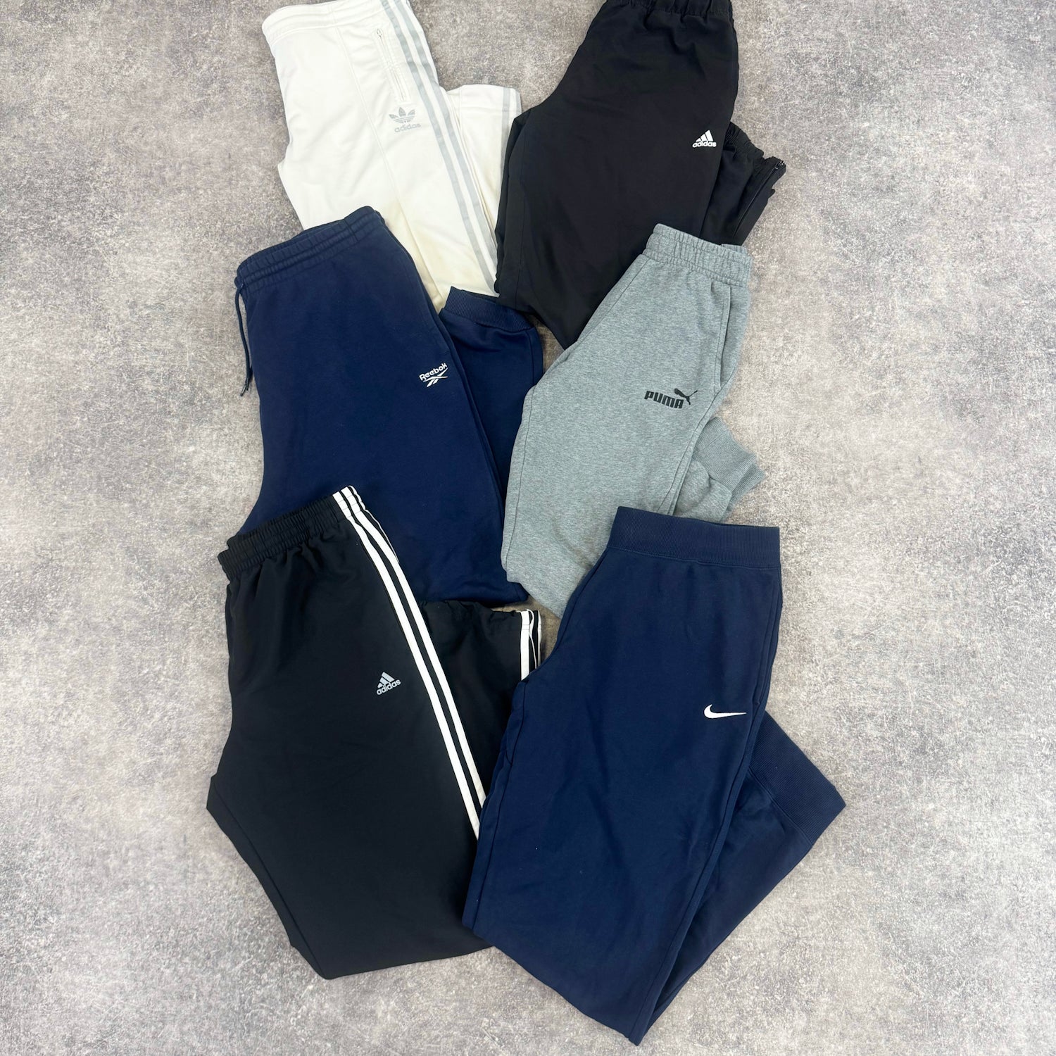 pantalon-jogging-homme-femme-marque-brand-adidas-nike-carhartt-lacoste-ralph-lauren-reebok-puma-moderne-vintage-vetement-grossiste-friperie-wholesaler-seconde-main-marque-occasion-textile-piece-80-90-2000-2010-french-pick