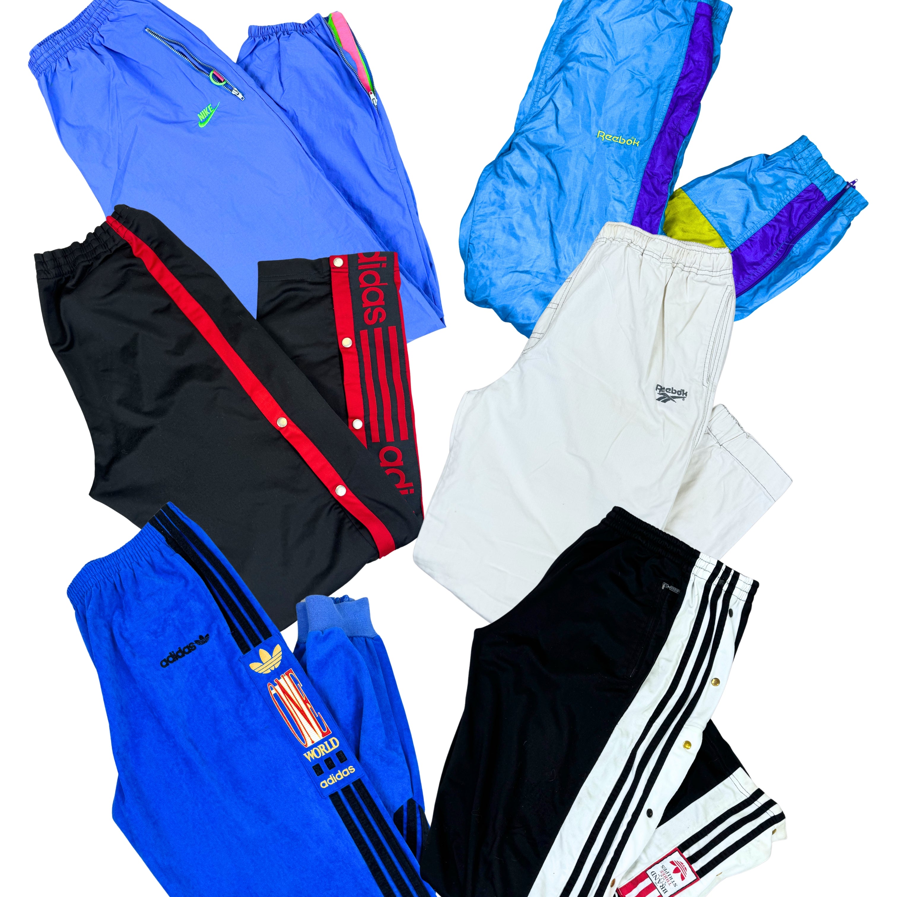 jogging-de-sport-pantalon-vintage-emblematiques-marques-brand-sport-sportswear-Adidas-Puma-Nike-Champion-Asics-Umbro-Champion-homme-femme-80-90-2000-Y2K-vetement-grossiste-friperie-wholesaler-seconde-main-occasion-textile-piece-80-90-2000-2010-french-pick-reseller-vinted