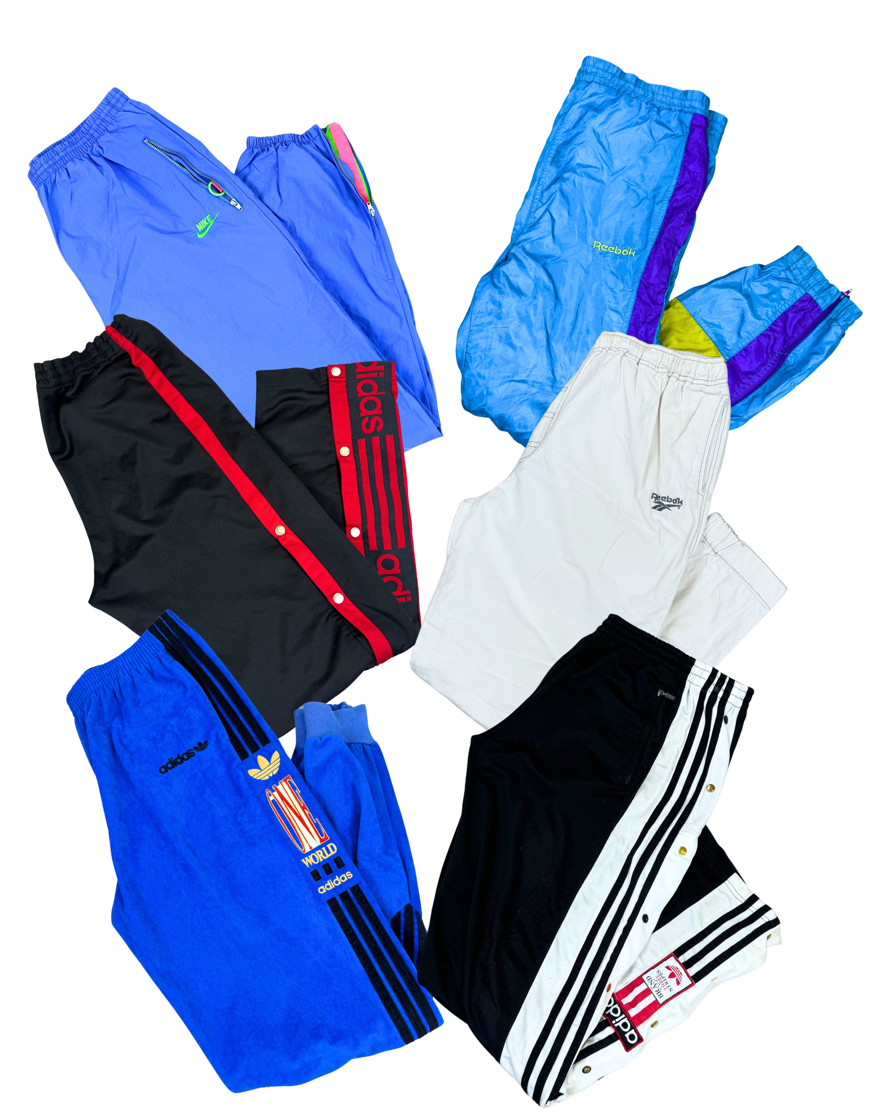 jogging-de-sport-pantalon-vintage-emblematiques-marques-brand-sport-sportswear-Adidas-Puma-Nike-Champion-Asics-Umbro-Champion-homme-femme-80-90-2000-Y2K-vetement-grossiste-friperie-wholesaler-seconde-main-occasion-textile-piece-80-90-2000-2010-french-pick-reseller-vinted