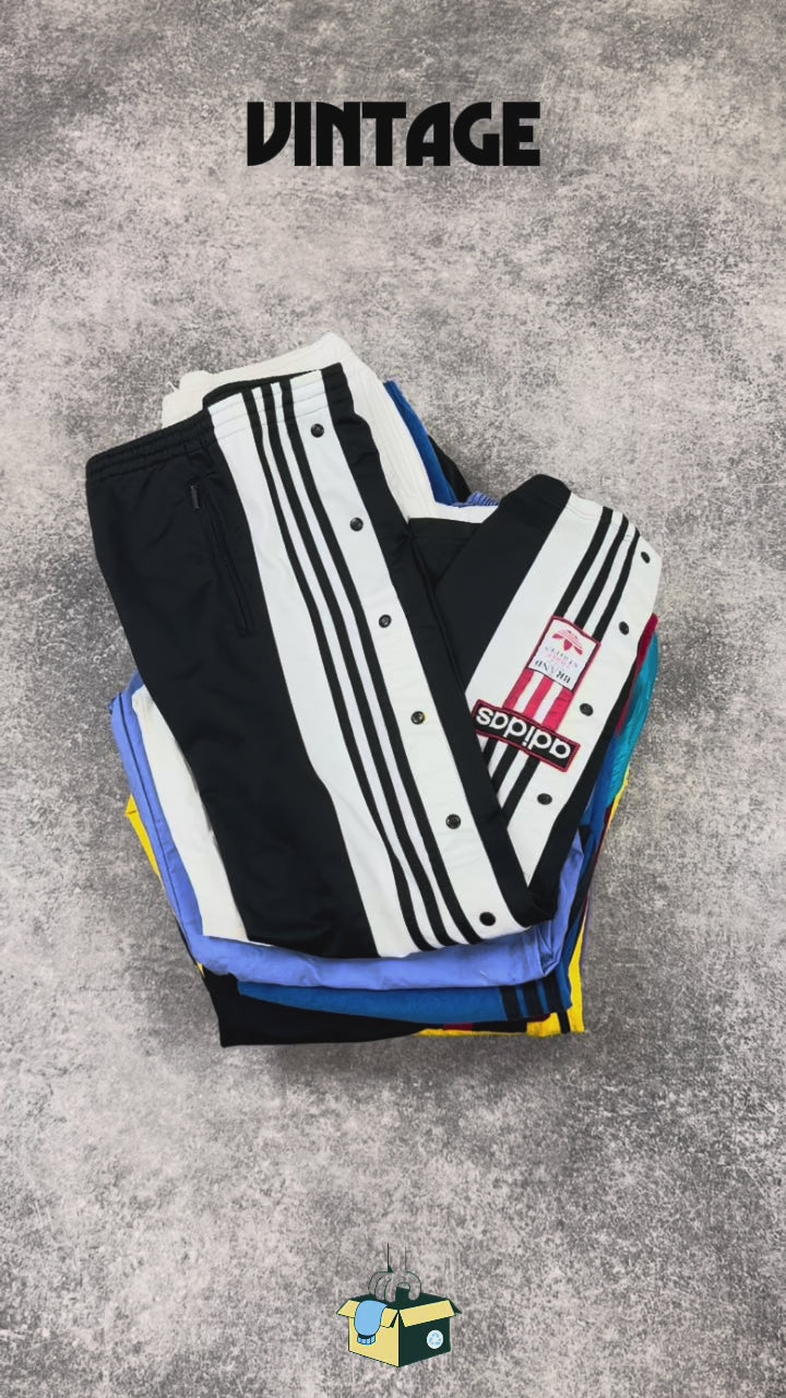 jogging-de-sport-pantalon-vintage-emblematiques-marques-brand-sport-sportswear-Adidas-Puma-Nike-Champion-Asics-Umbro-Champion-homme-femme-80-90-2000-Y2K-vetement-grossiste-friperie-wholesaler-seconde-main-occasion-textile-piece-80-90-2000-2010-french-pick-reseller-vinted